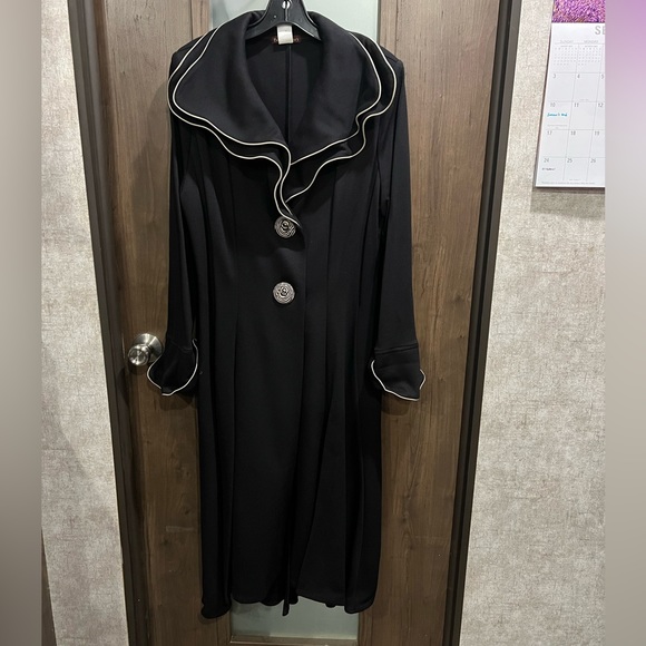 Beautiful long coat with fancy collar and sleeves.